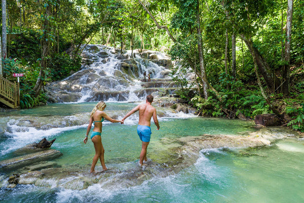 Visitors climbing Dunn’s River Falls in Ocho Rios, Jamaica